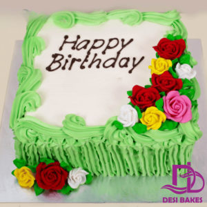 Desi Green Birthday Multicolored Flowers Cake