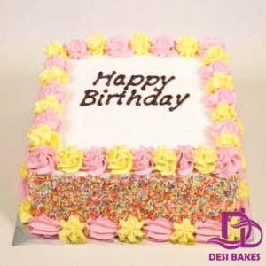 Desi Yellow And Pink Birthday Cake